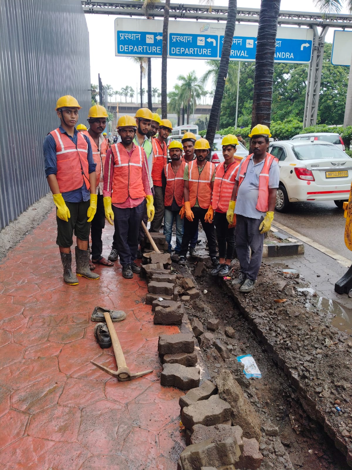 Project team on site near the airport access road after fiber duct work